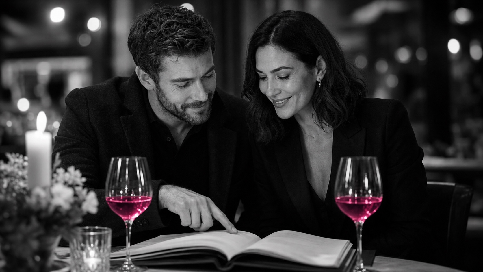 Emma and her boyfriend at the restaurant, black and white